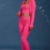 Pantalones acampanados con vuelta y punto trenzado en rosa intenso