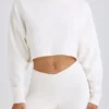 Pantalones acampanados de jersey de algodón texturizado en blanco