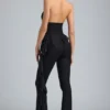 Pantalones acampanados de talle bajo con volantes metalizados Reese en negro