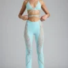 Pantalones acampanados de talle medio con adornos Stevie en azul hielo