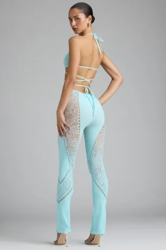 Pantalones acampanados de talle medio con adornos Stevie en azul hielo