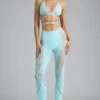 Pantalones acampanados de talle medio con adornos Stevie en azul hielo