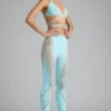 Pantalones acampanados de talle medio con adornos Stevie en azul hielo
