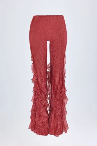 Pantalones acampanados de talle medio con volantes Felicity en estampado rojo