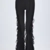 Pantalones acampanados de talle medio con volantes Felicity en negro