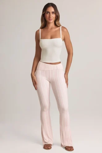 Pantalones acampanados de talle medio con vuelta de Bebe en modal y estampado de rayas