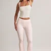 Pantalones acampanados de talle medio con vuelta de Bebe en modal y estampado de rayas