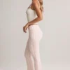 Pantalones acampanados de talle medio con vuelta de Bebe en modal y estampado de rayas