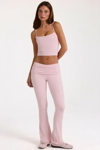 Pantalones acampanados de talle medio en modal color rosa palo