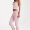 Pantalones acampanados de talle medio en modal color rosa palo