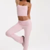 Pantalones acampanados de talle medio en modal color rosa palo