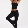 Pantalones acampanados de talle medio en modal negro
