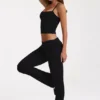 Pantalones acampanados de talle medio en modal negro