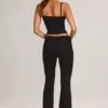 Pantalones acampanados de talle medio Patsy Modal en negro