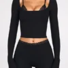 Pantalones acampanados de talle medio Philippa Modal en negro