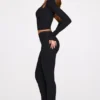 Pantalones acampanados de talle medio Philippa Modal en negro