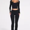 Pantalones acampanados de talle medio Philippa Modal en negro