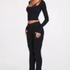 Pantalones acampanados de talle medio Philippa Modal en negro