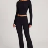 Pantalones acampanados de talle medio Vevina Modal en negro