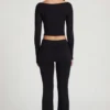 Pantalones acampanados de talle medio Vevina Modal en negro