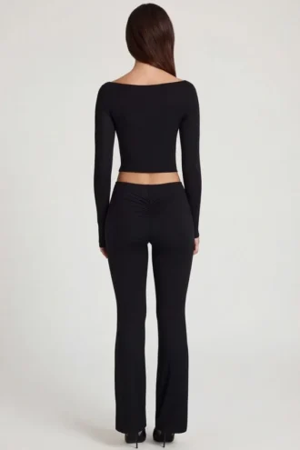 Pantalones acampanados de talle medio Vevina Modal en negro