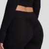 Pantalones acampanados de talle medio Vevina Modal en negro