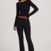 Pantalones acampanados de talle medio Vevina Modal en negro