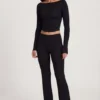 Pantalones acampanados de talle medio Vevina Modal en negro