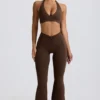 Pantalones acampanados fruncidos de jersey cepillado en color Pecan Marl