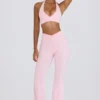 Pantalones acampanados fruncidos de jersey cepillado en rosa pálido jaspeado