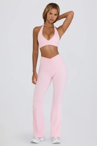 Pantalones acampanados fruncidos de jersey cepillado en rosa pálido jaspeado