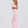 Pantalones acampanados fruncidos de jersey cepillado en rosa pálido jaspeado