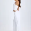 Pantalones anchos con aberturas y cinturón Zaria en blanco