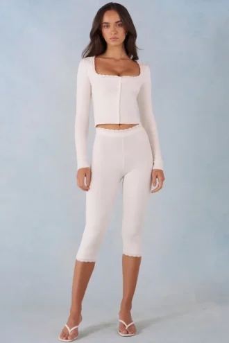 Pantalones capri de punto Selene de talle medio en color marfil