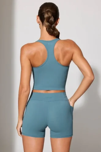 Pantalones Cortos con cintura retorcida y bolsillos en azul piedra
