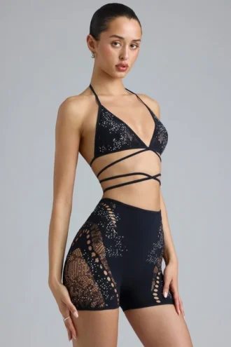Top de bikini con tirantes cruzados y adornos Liberty en negro