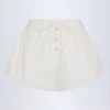 Pantalones Cortos de popelín de algodón con lazo delantero Elsie en blanco