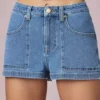 Pantalones Cortos de talle alto y corte acampanado Beata en lavado azul medio