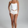 Pantalones cortos de talle bajo de jersey elástico Sabrine en blanco