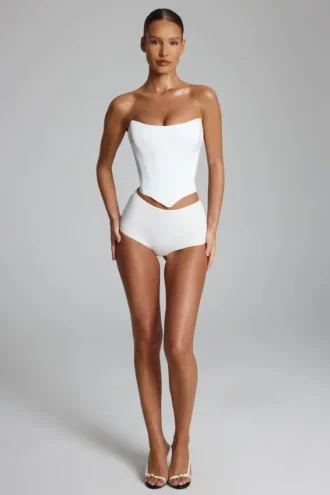 Pantalones cortos de talle bajo de jersey elástico Sabrine en blanco
