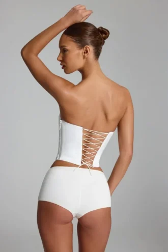 Pantalones cortos de talle bajo de jersey elástico Sabrine en blanco