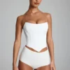 Pantalones cortos de talle bajo de jersey elástico Sabrine en blanco