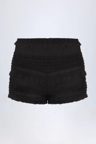 Pantalones Cortos de talle medio con volantes Orla en negro