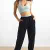 Pantalones de chándal de algodón con felpa y cintura media en negro