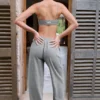 Pantalones de chándal de algodón texturizado con botones, de talle bajo y pierna ancha en gris oscuro