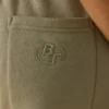 Pantalones de chándal de felpa de algodón de talle medio en verde caqui