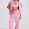 Pantalones de chándal de jersey de algodón suave, de talle medio y pierna ancha en rosa bebé