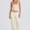 Pantalones de chándal de pierna ancha de punto acanalado en color crema