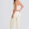Pantalones de chándal de pierna ancha de punto acanalado en color crema