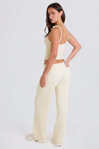 Pantalones de chándal de pierna ancha de punto acanalado en color crema